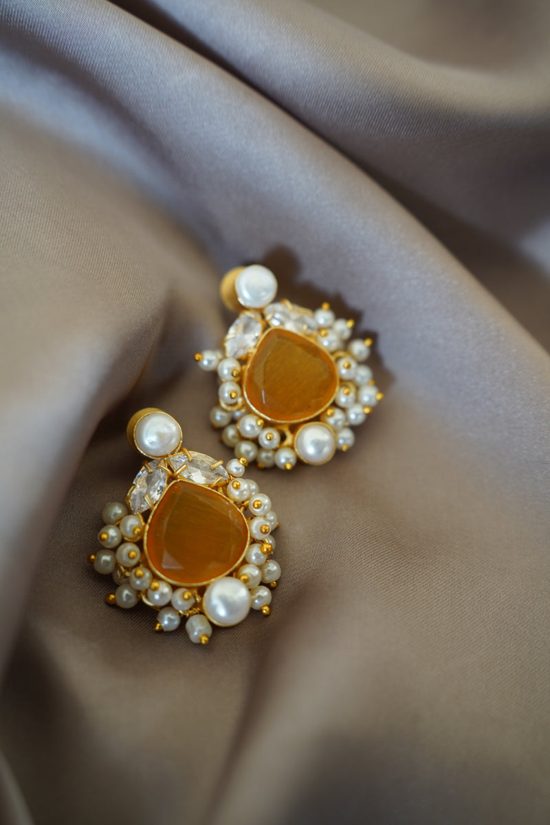Yellow statement studs